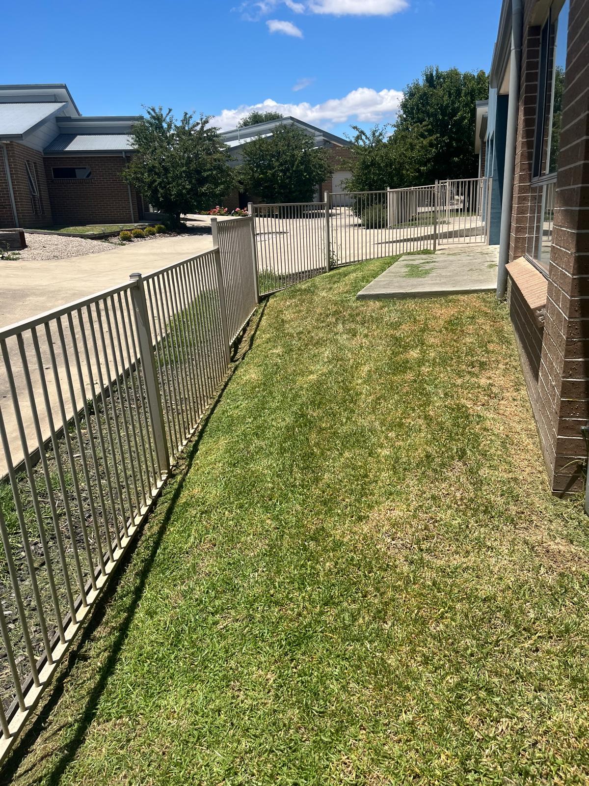 Overgrown lawn mow after work was completed